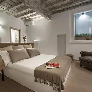 https://charmsuite-raffaello.it-romehotels.com